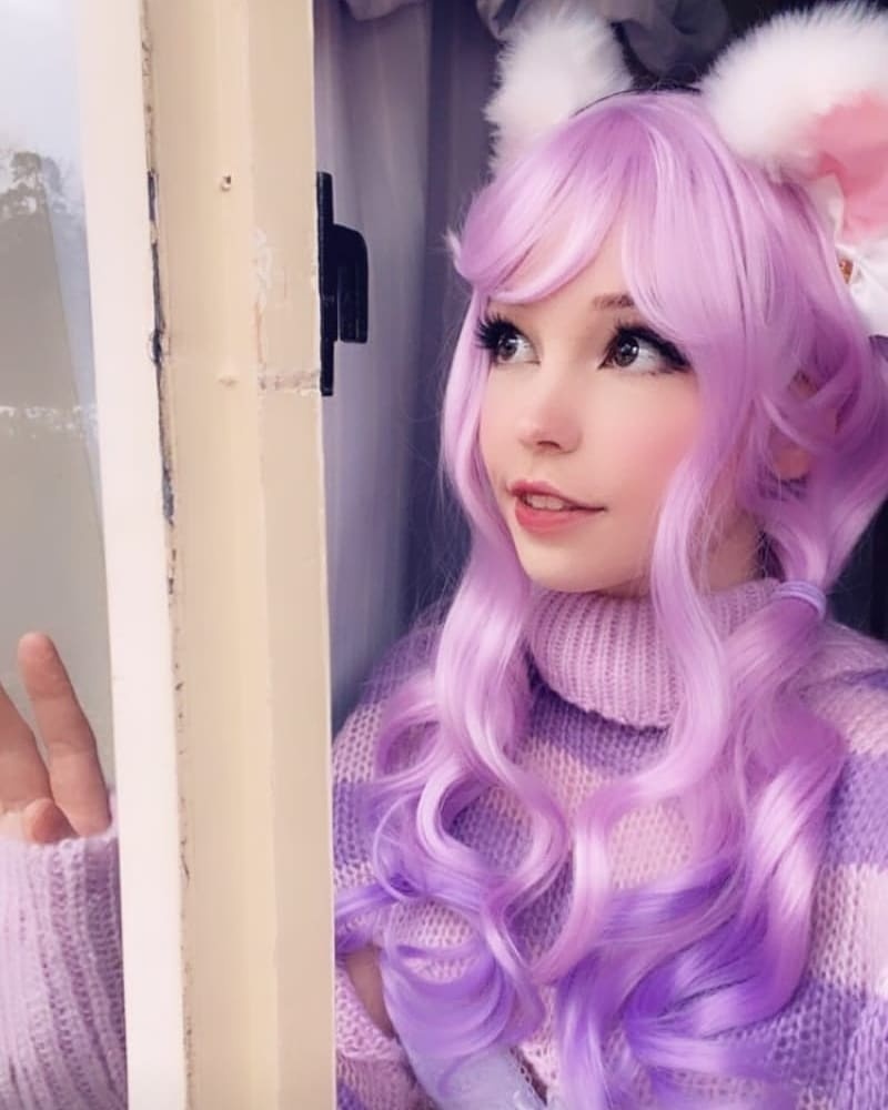 Belle Delphine's short purple and pink sweater on her Instagram